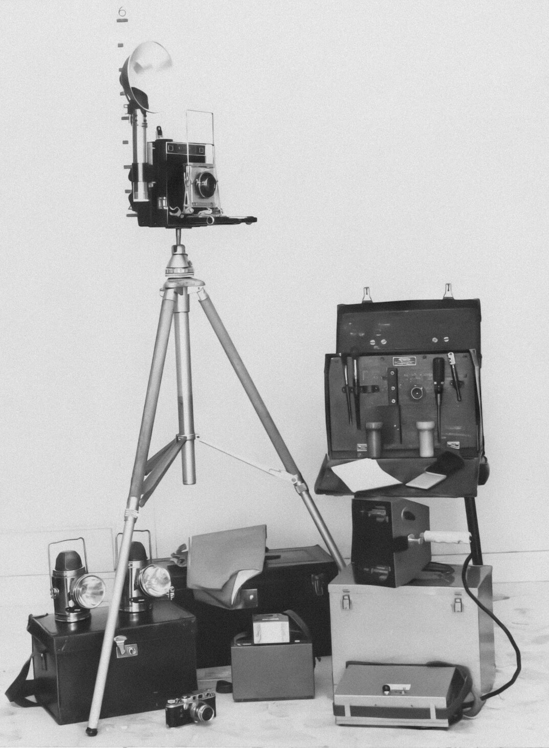 Vintage television studio with projectors and cameras on tripods