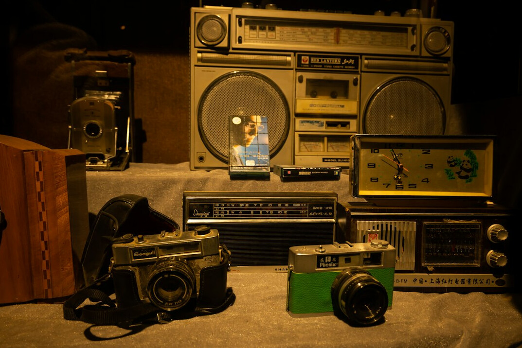 Retro television studio with vintage cameras and warm stage lighting